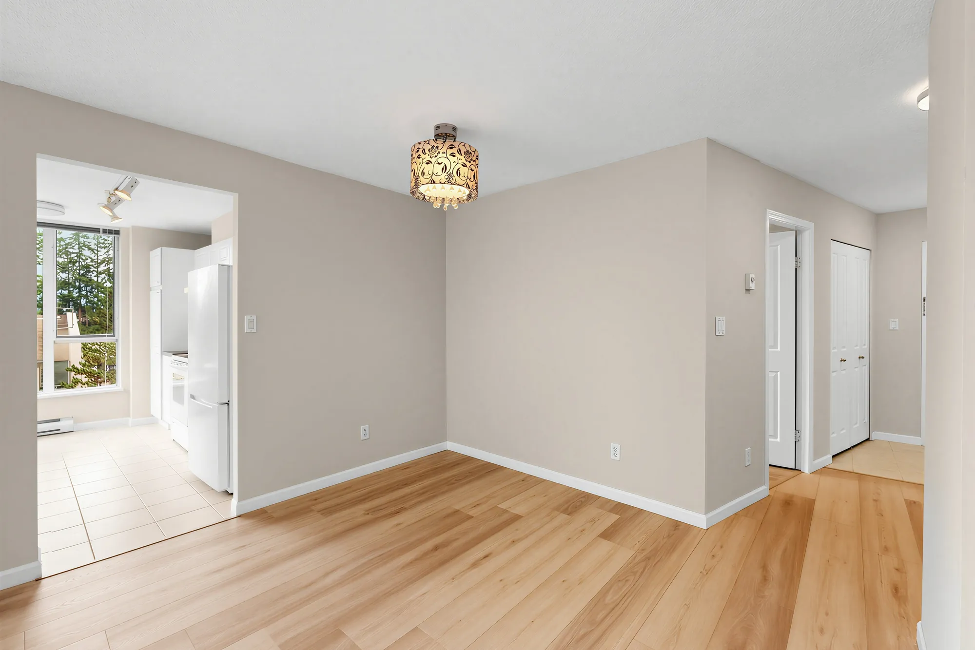 The dining room and the doorway through to the kitchen