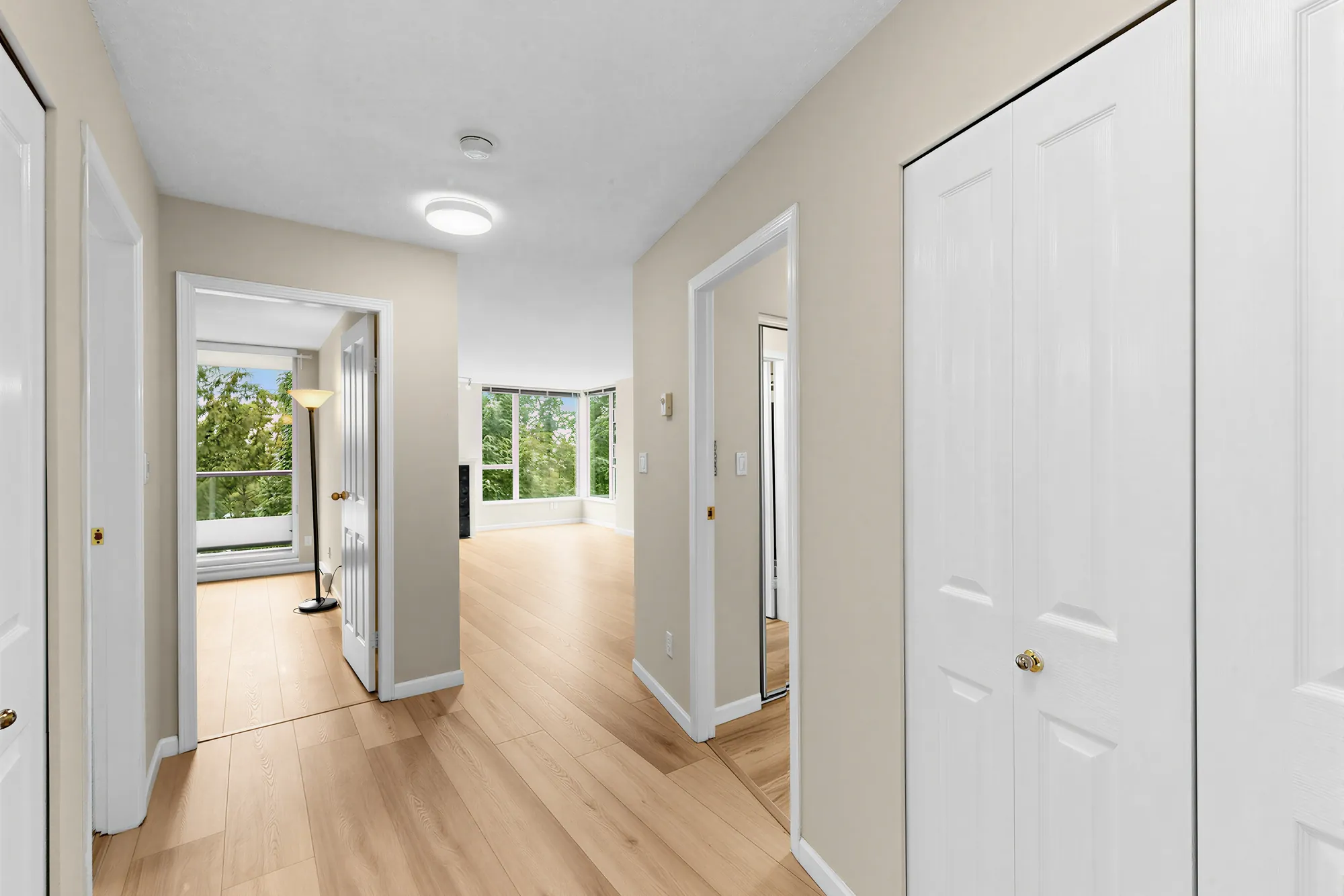The hall running from the entry past the storage room