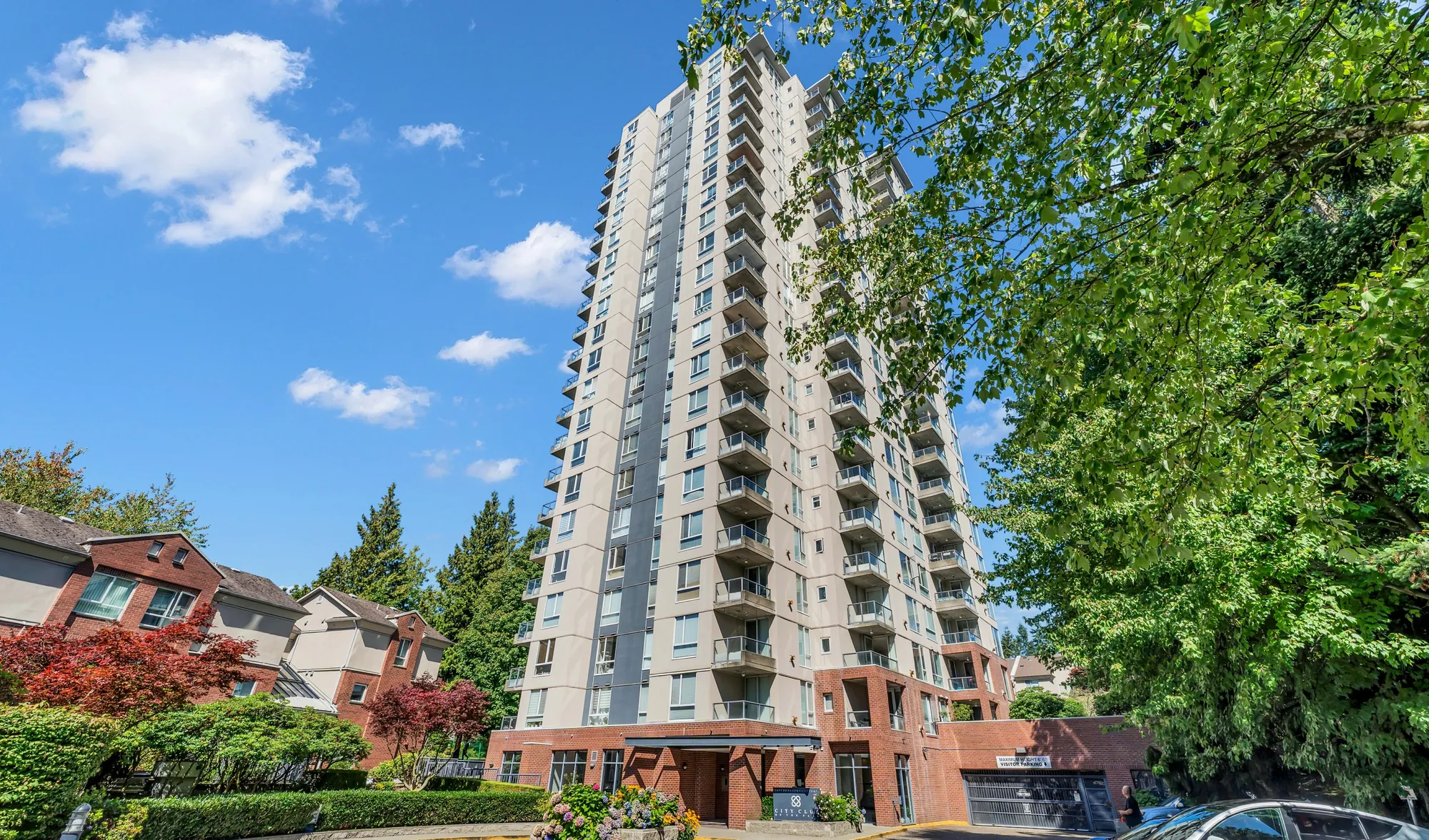 City Club on the Park at 7077 Beresford Street, the tower seen from the street among mature trees