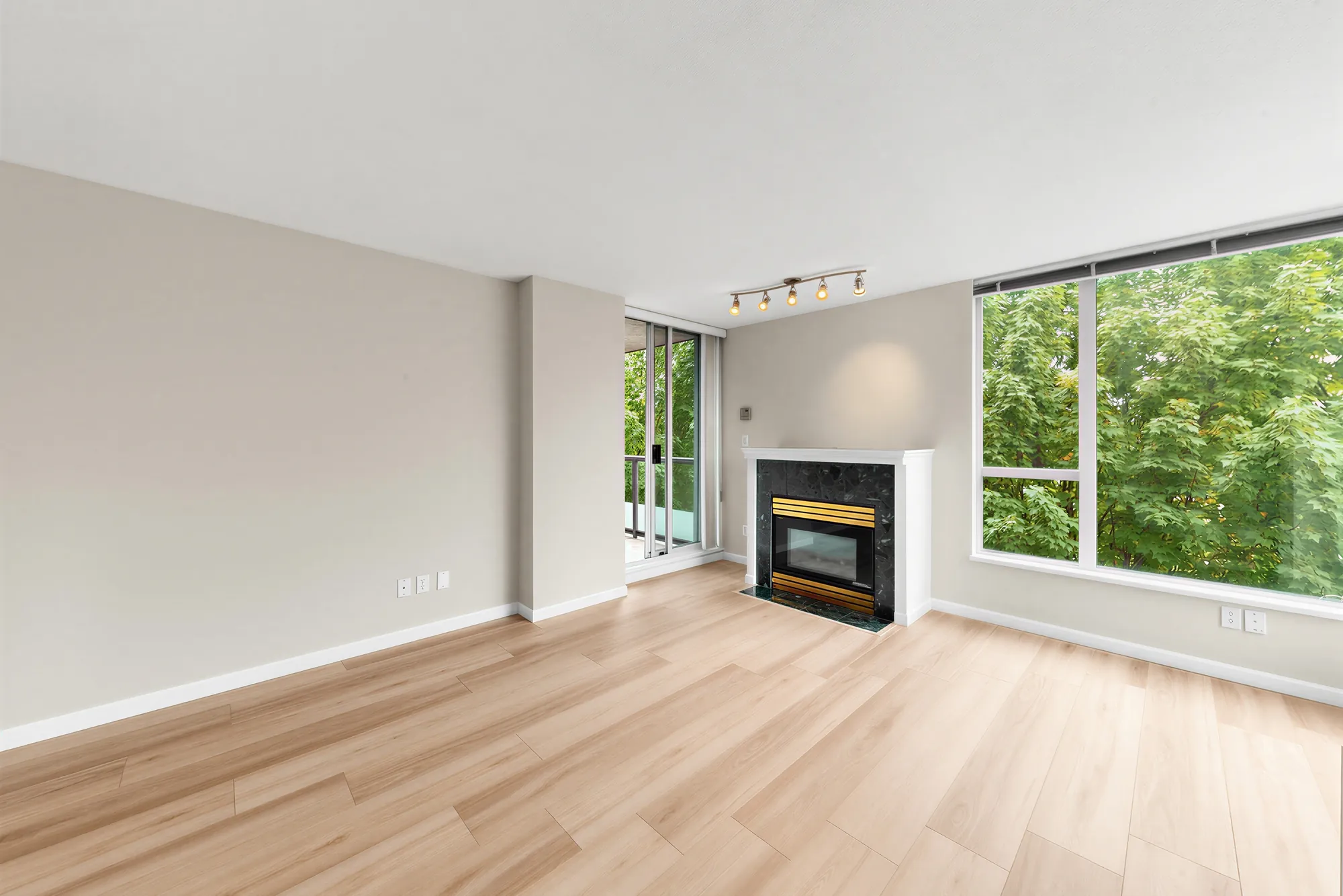 The living room from the hall, sliding door to the balcony on the right